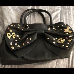 Sharp and Funky Betsey Johnson Bag light used